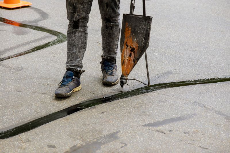 Experienced Asphalt Sealing Technician